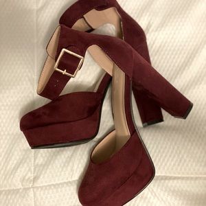 Size 7 merlot colored heels. Never worn